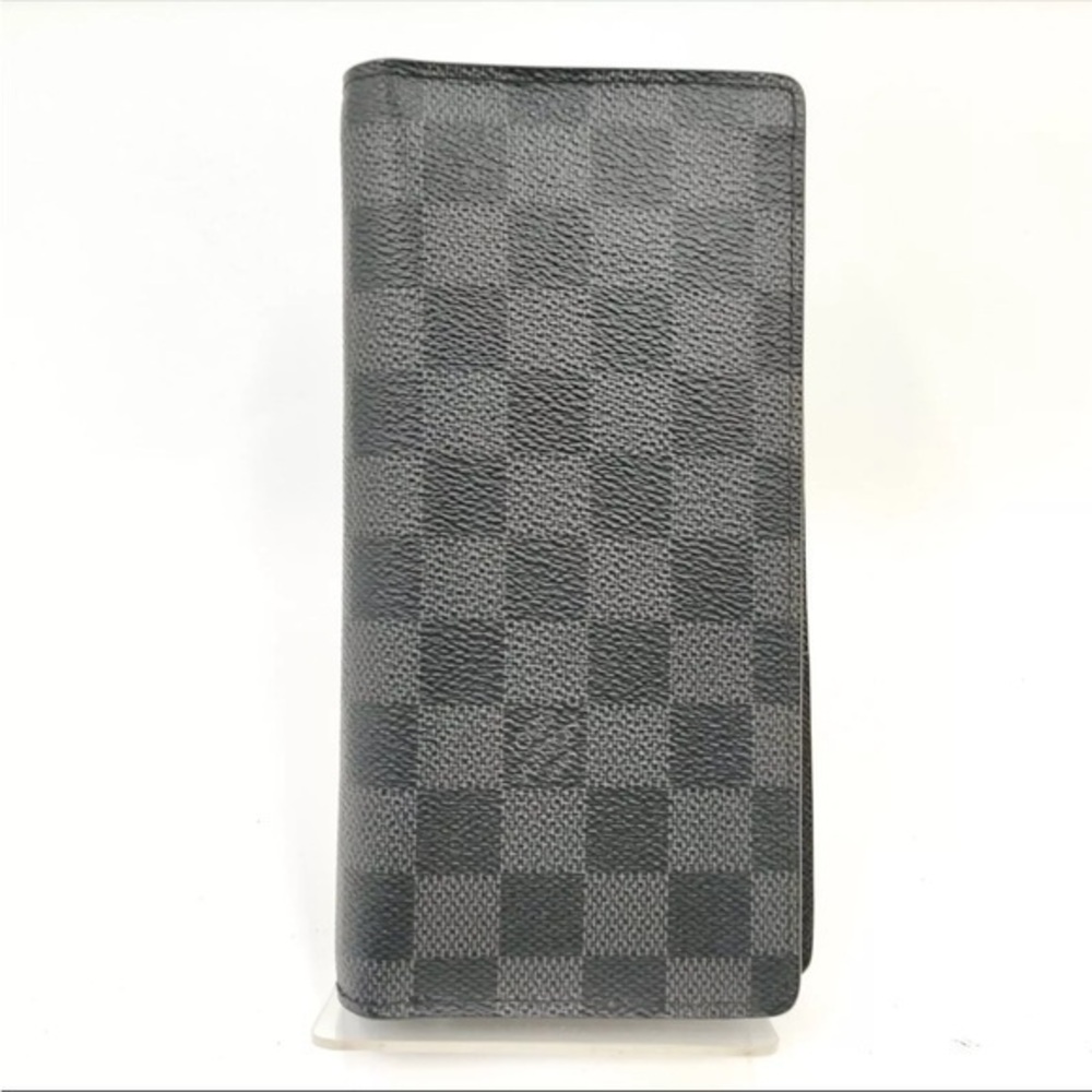 Louis Vuttton Damier Graphite wallet.